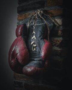 Boxing gloves to illustrate that while competitive aikido is good, it does not have to be a fight.